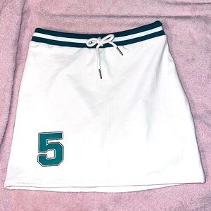 Adika white and green tennis mini skirt